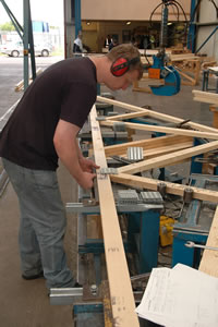 Roof truss being assembled